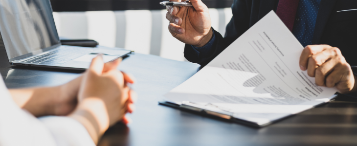 Attorney speaking with a client about setting up a trust